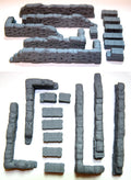 Collection of gray textured building blocks on a white background