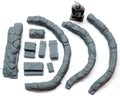 Collection of gray plastic model parts on a white background