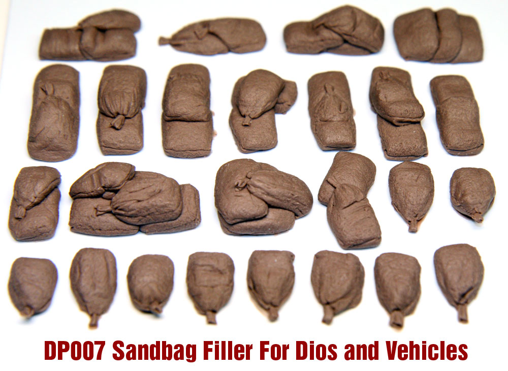 Collection of brown sandbag filler pieces for dioramas and vehicles on a white background.