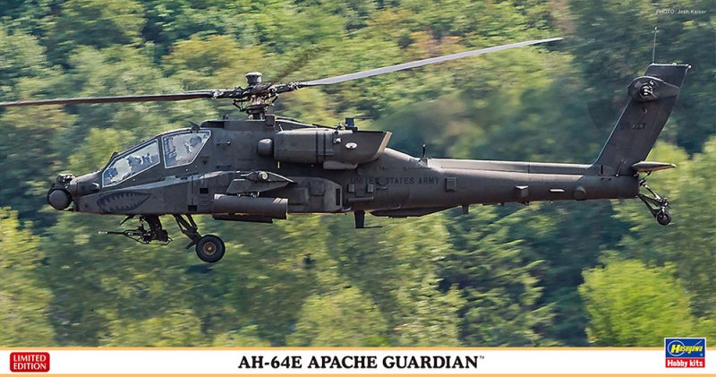 AH-64E Apache Guardian military helicopter in dark gray camouflage flying over a green forest background, with product text and logos along the bottom.