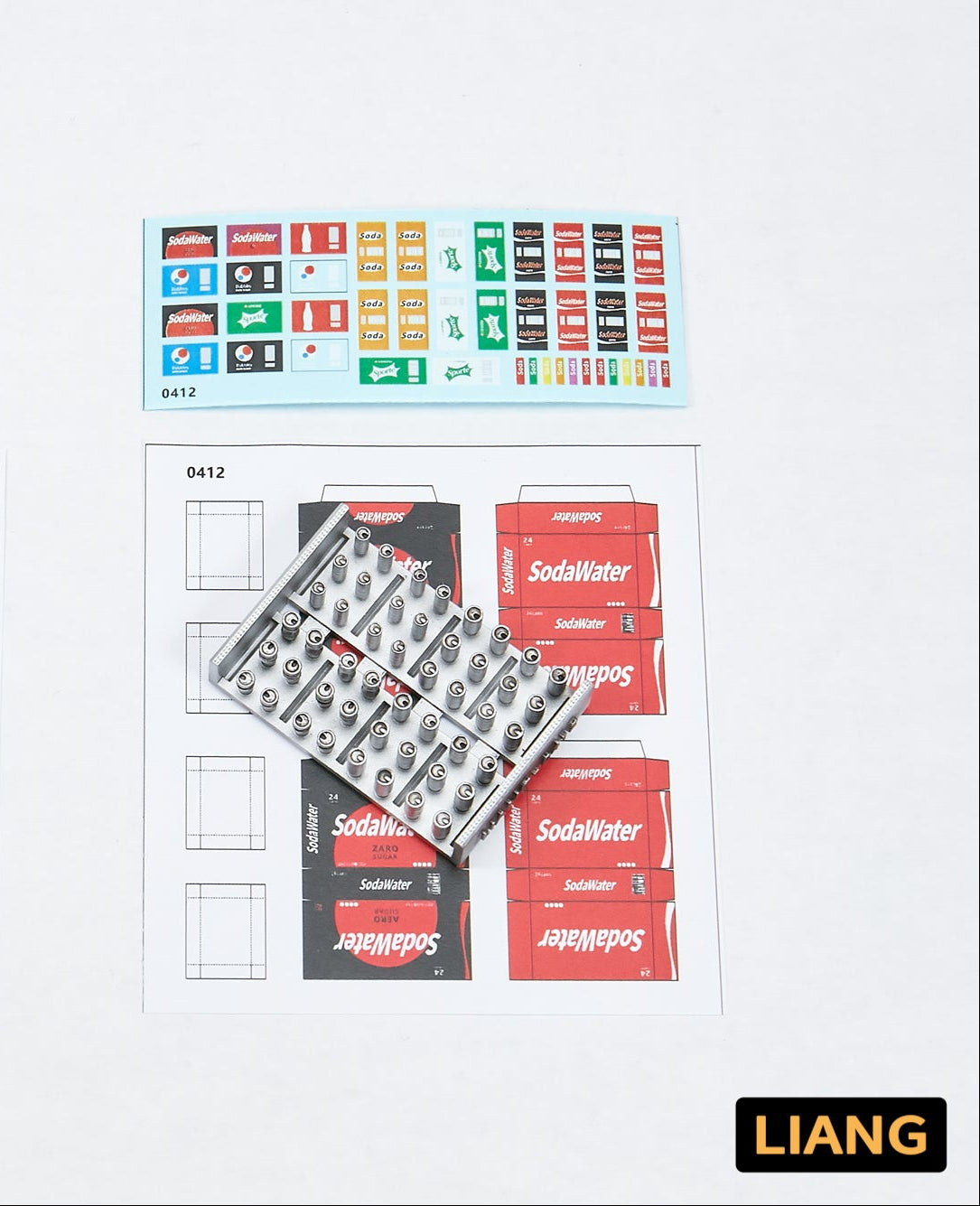Liang Model LIANG-0411 1/35 soda cans and cardboard boxes showing the included printed decal sheets and cardboard box templates for the 1990's - 2000's.