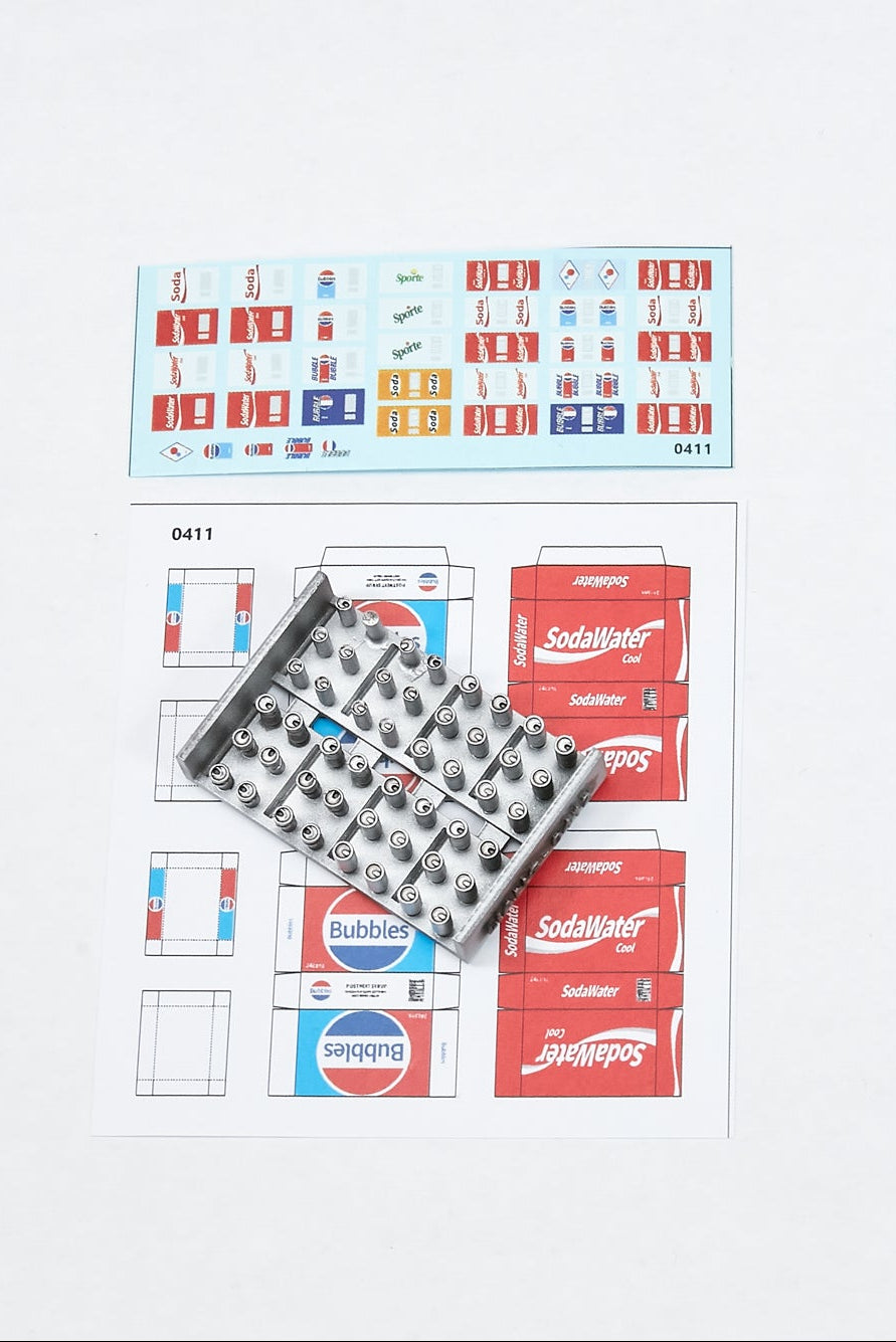 Liang Model LIANG-0411 1/35 soda cans and cardboard boxes showing the included printed decal sheets and cardboard box templates for the 1960s–1990s set.