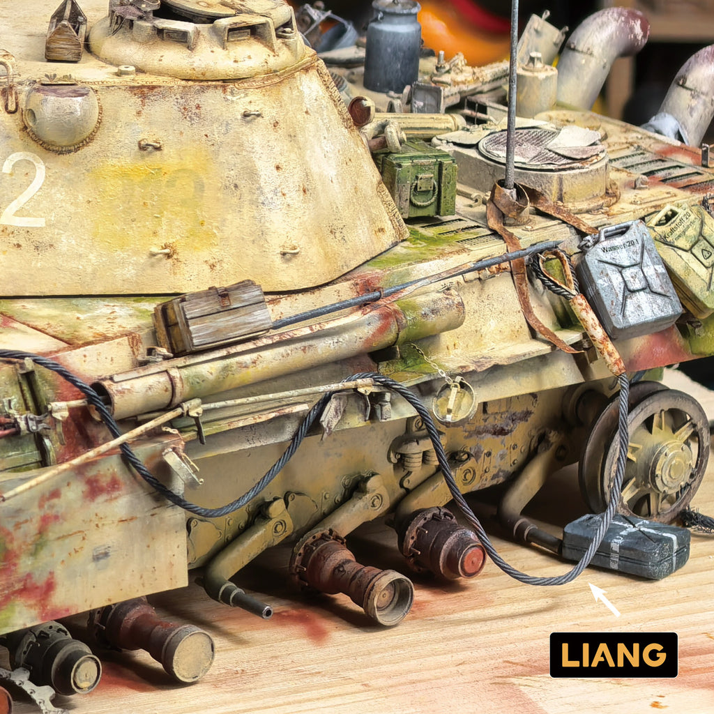 Liang Model 0450E Soft Tow Cable shown routed across a weathered scale tank, demonstrating its flexibility and realistic tow-cable detail.