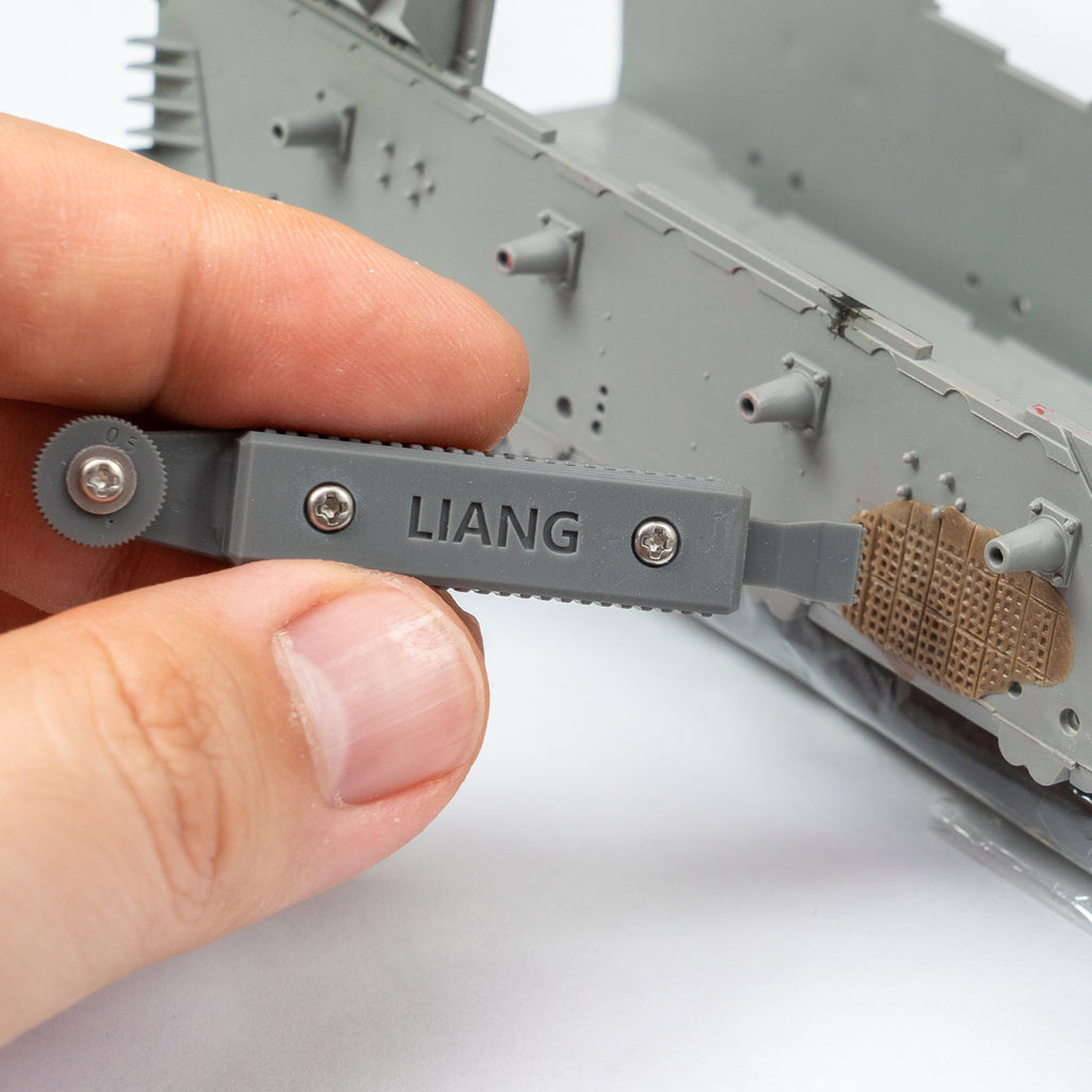 Liang Model LIANG-0229B Zimmerit Coat Upgrade Tool being used to create a detailed grid-pattern Zimmerit texture on a scale German armored vehicle.