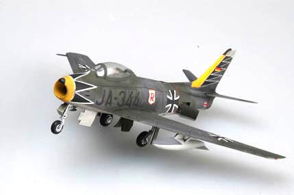 Model of a fighter jet with a visible German Luftwaffe insignia on a white background