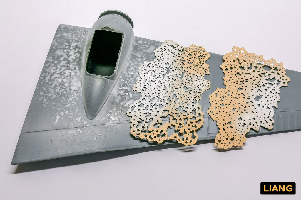 Liang Salt Weathering Airbrush Stencils 0007 applied to a scale model aircraft wing for weathering effects