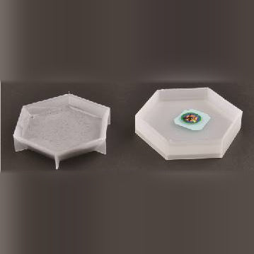 Two Master Tools 09913 hexagonal paint trays, one empty and one holding mixed paint.