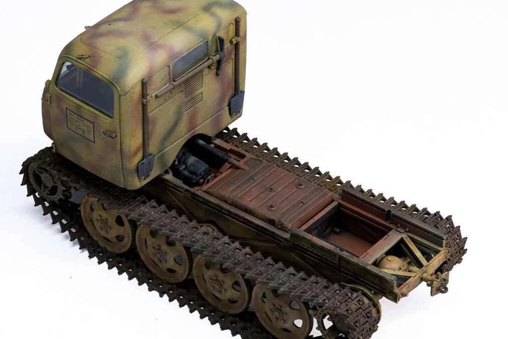 Top view of the Tamiya 1/35 RSO/01 chassis with cab fitted and cargo bed removed, showing tracks and running gear