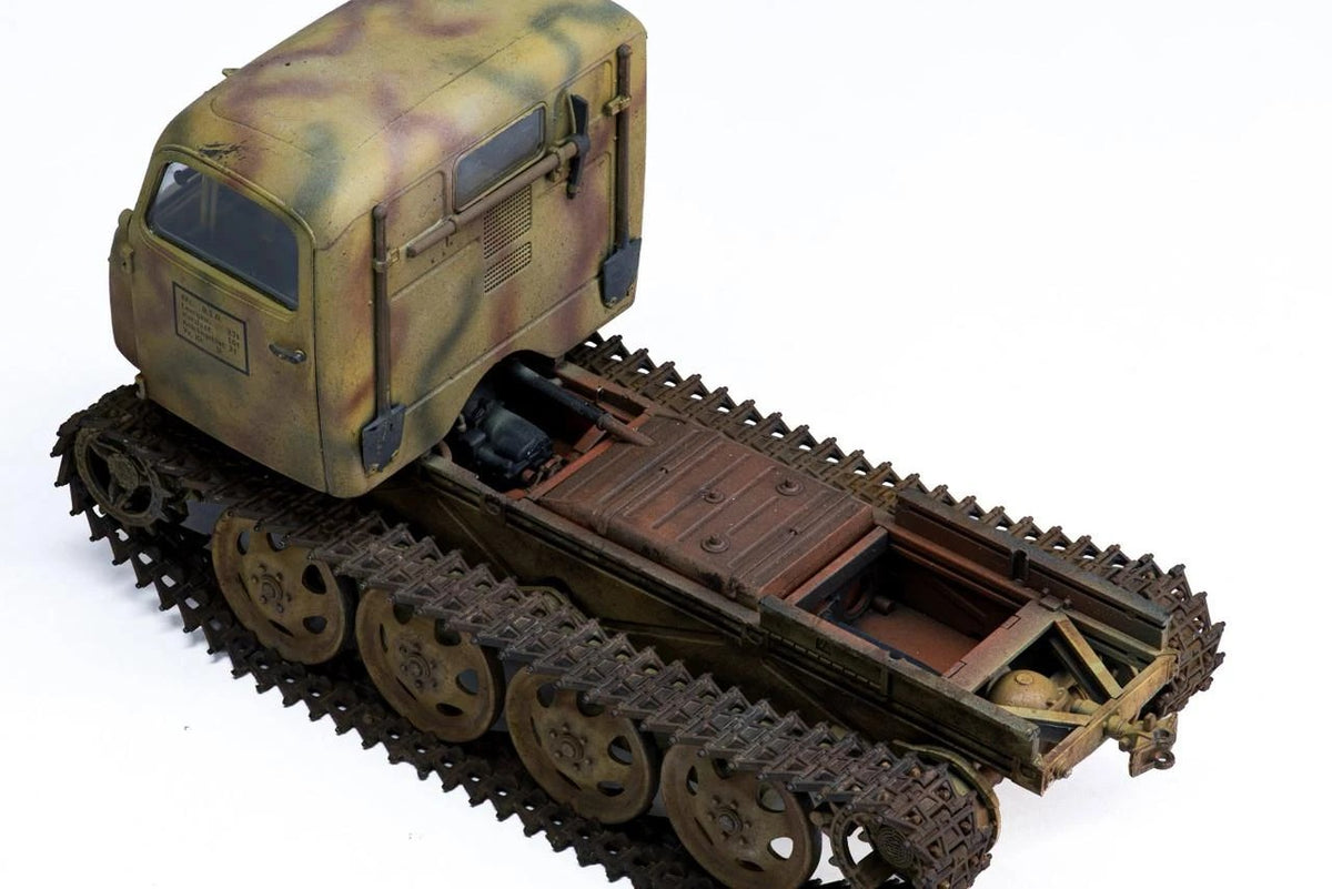 Top view of the Tamiya 1/35 RSO/01 chassis with cab fitted and cargo bed removed, showing tracks and running gear